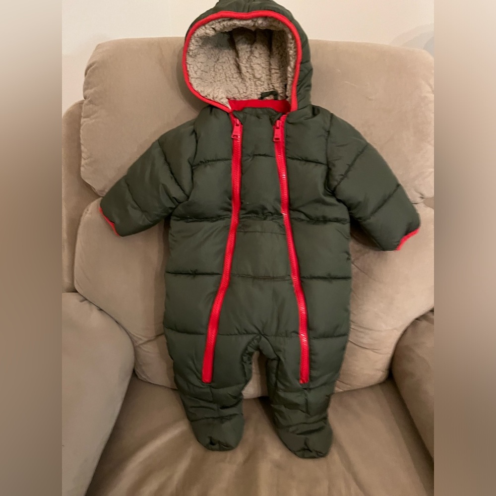 DKNY. 6-9 month snow suit worn twice. Nice and warm